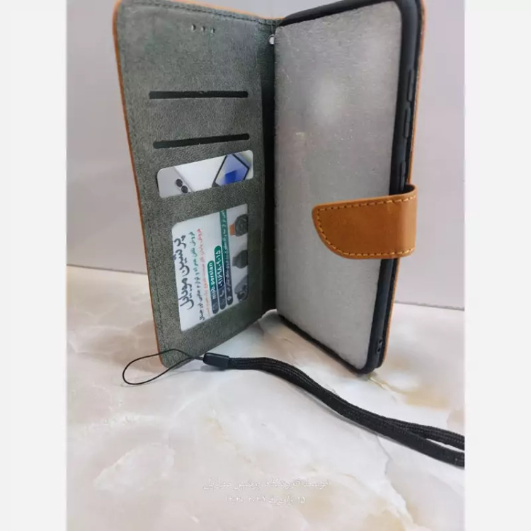 کیف poco c65 و redmi 13c چرمی درجه یک کیف استندشو همراه با بند مچی با خرید کیف تصویرlcd گوشی رو تضمین کن جا کارتی دار