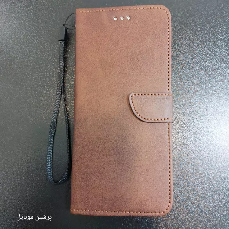 کیف poco c65 و redmi 13c چرمی درجه یک کیف استندشو همراه با بند مچی با خرید کیف تصویرlcd گوشی رو تضمین کن جا کارتی دار