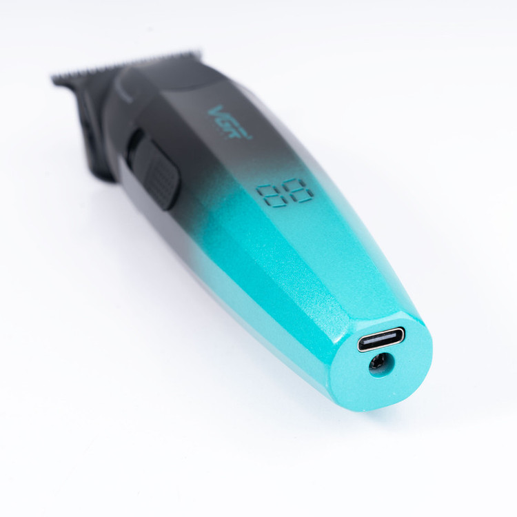ماشین اصلاح موی سر و صورت وی جی آر مدل V-906 با تیغه سرامیکی پوشش DLC، موتور 9000 دور در دقیقه، باتری 2000 میلیآمپر ساعت با 240 دقیقه عمر شارژ، صفحه نمایش LED، طراحی ارگونومیک و مقاوم، قابلیت صفرزن، خط زن و حجم زن