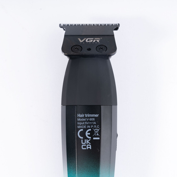 ماشین اصلاح موی سر و صورت وی جی آر مدل V-906 با تیغه سرامیکی پوشش DLC، موتور 9000 دور در دقیقه، باتری 2000 میلیآمپر ساعت با 240 دقیقه عمر شارژ، صفحه نمایش LED، طراحی ارگونومیک و مقاوم، قابلیت صفرزن، خط زن و حجم زن